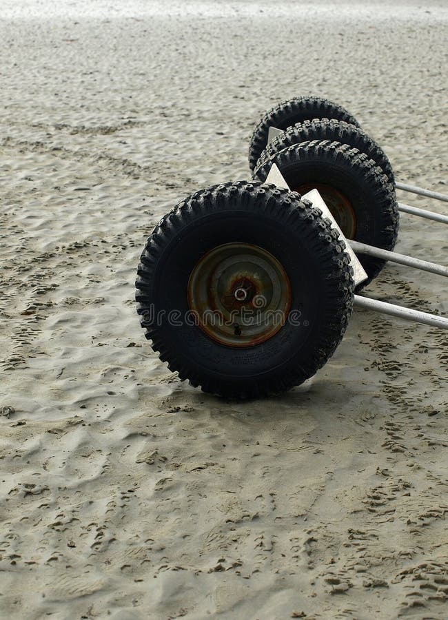 Trailer wheels on beach stock image. Image of wheels 21890267