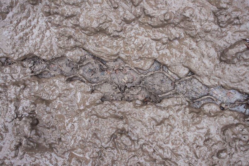 Trails from a truck on a road stock photos