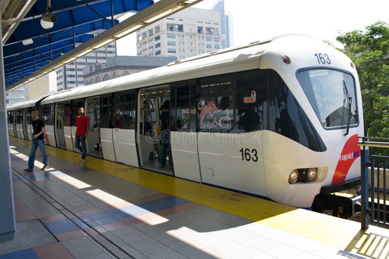 Train arrives at a train station. Kuala Lumpur royalty free stock photography