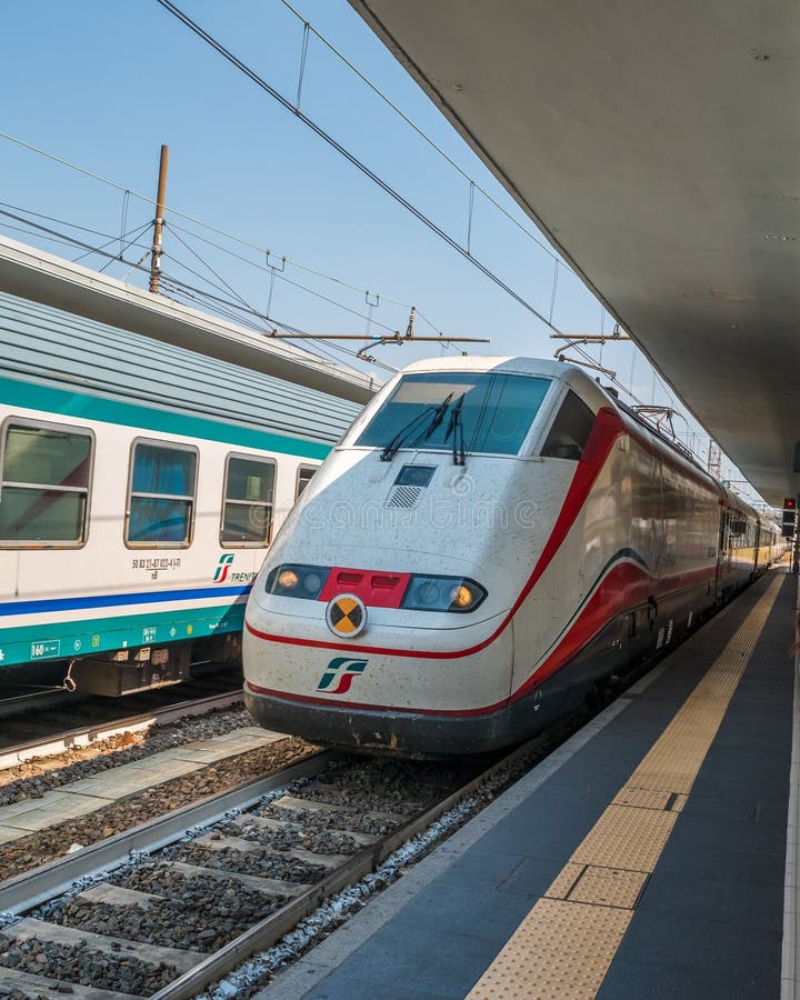 Train Arriving at the Platform of Bologna Central Railway Station