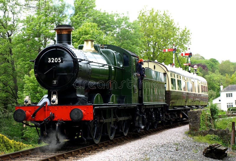 Green Steam engine train at Buckfastleigh Station, Devon England royalty free stock photography