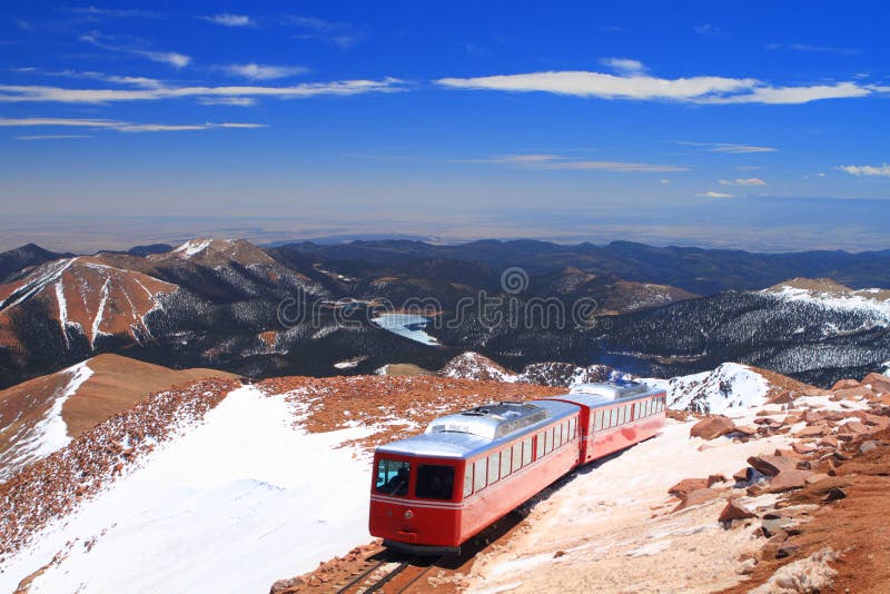 View of Pikes Peak and Manitou Springs Train on the top of Pikes Peak Mountain, Colorado, USA. View of Pikes Peak and Manitou Springs Train on the top of Pikes Peak Mountain, Colorado, USA