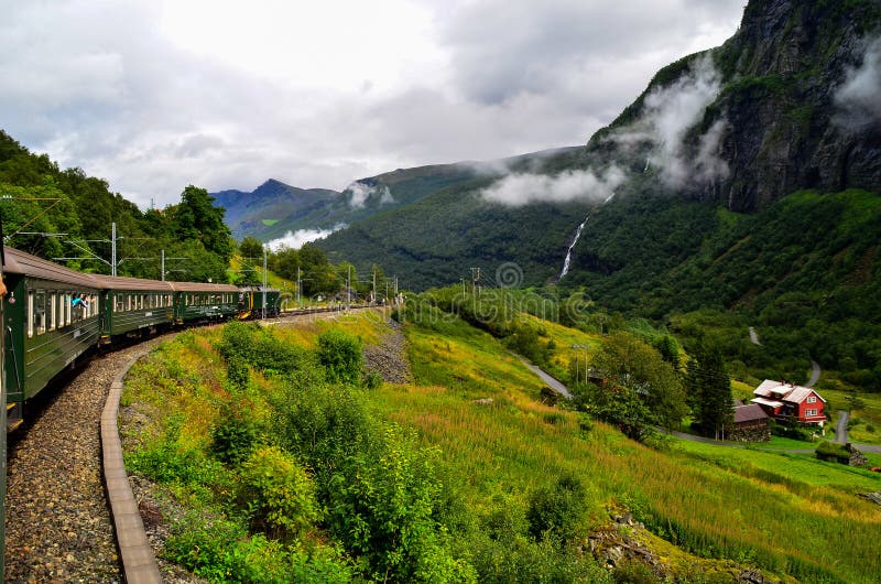 Flam train is going to Flam from Sognfjord through the perfect Norway`s landscape. Flam train is going to Flam from Sognfjord through the perfect Norway`s landscape