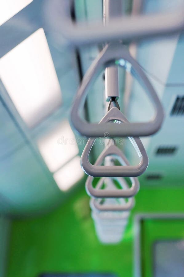 Train hand grips stock image. Image of interior, hang 9170221