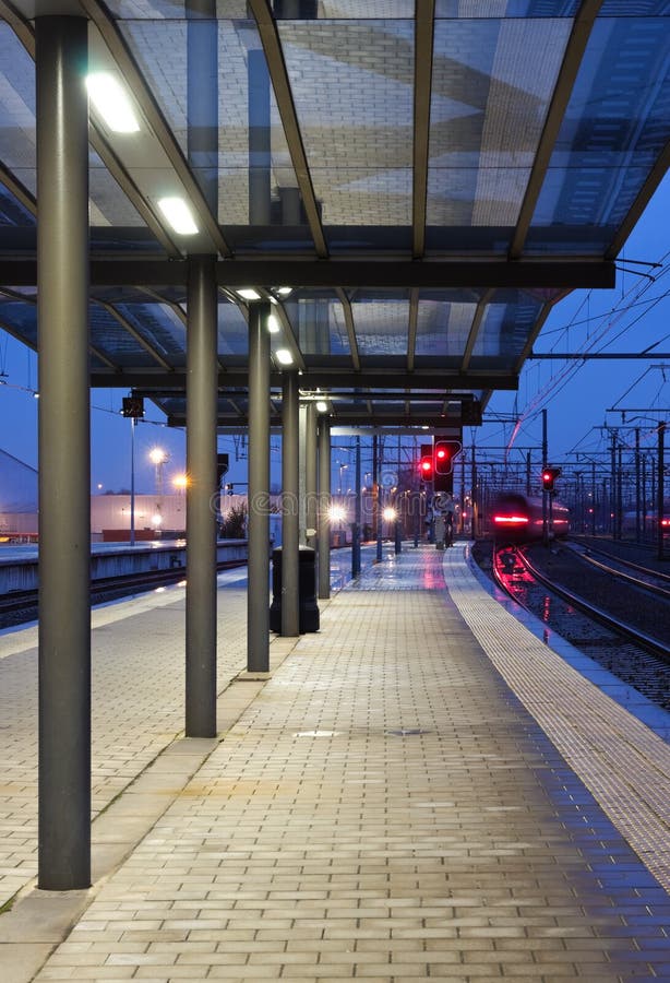 Download Train leaving the station stock photo. Image of reflections - 4457876