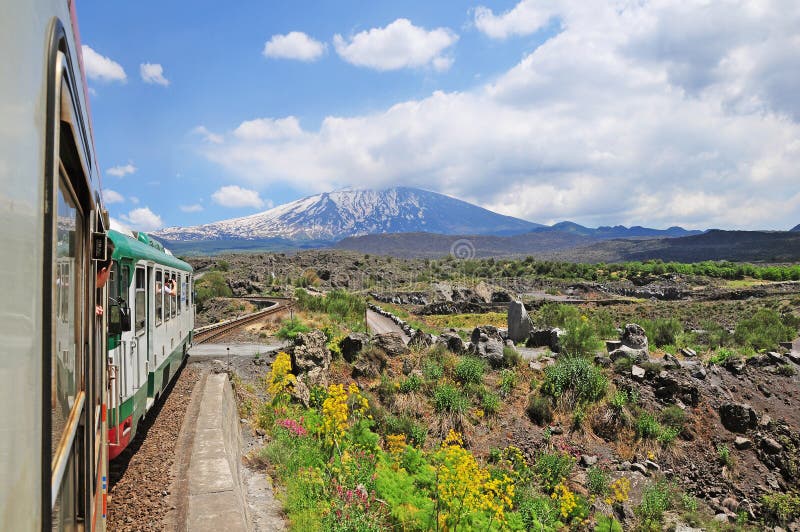 Train moves around Etna volcano. Sicily