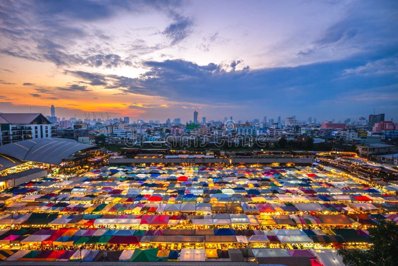 Talat Rotfai, also known as the Train Night Market, is a chain of night markets in Bangkok, Thailand. Originally located near the Chatuchak Weekend Market on State Railway of Thailand SRT land, it has since relocated to Srinagarindra Road, with a second branch on Ratchadaphisek Road and a third on Prasoet Manu Kit Road. Talat Rotfai, also known as the Train Night Market, is a chain of night markets in Bangkok, Thailand. Originally located near the Chatuchak Weekend Market on State Railway of Thailand SRT land, it has since relocated to Srinagarindra Road, with a second branch on Ratchadaphisek Road and a third on Prasoet Manu Kit Road.