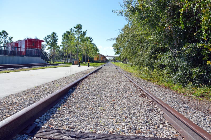 Train tracks to the depot stock photo. Image of blue 45799498