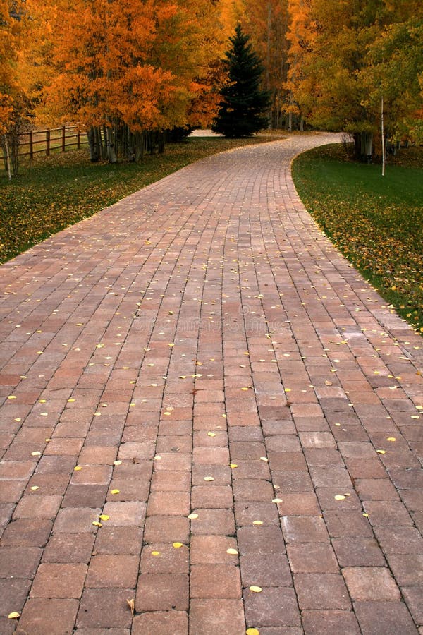 Brick pathway dissapearing into autumn,fall in Idaho. Brick pathway dissapearing into autumn,fall in Idaho