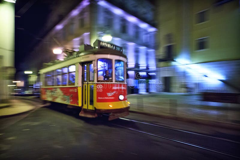 Tram 28 passing through Lisbon streets