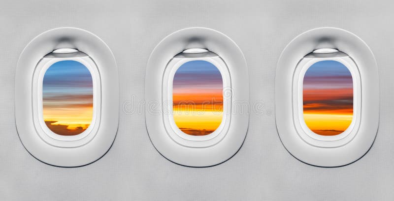 Tramonto alla finestra dell'aeroplano immagini stock libere da diritti Tramonto alla finestra dell'aeroplano immagini stock libere da diritti