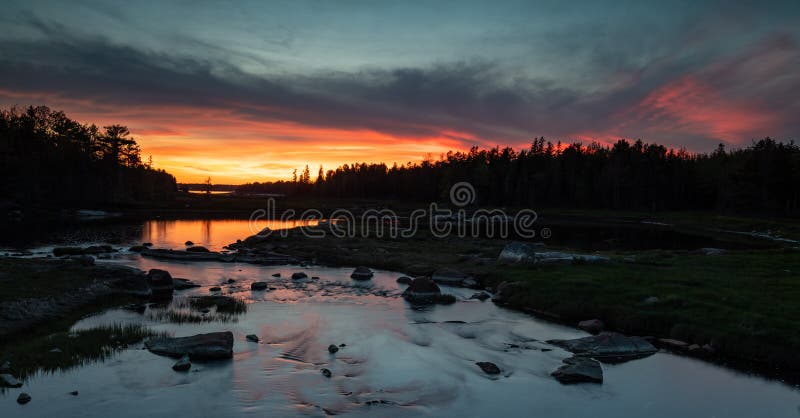 Tramonto nel parco nazionale di acadia fotografia stock Tramonto nel parco nazionale di acadia fotografia stock