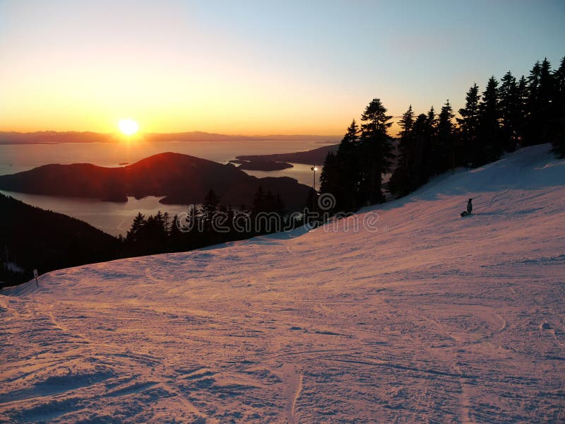 Located in West Vancouver BC Cypress Resort has views of the mountain and the Pacific Ocean. Pine trees and a lonely snowboarder. Located in West Vancouver BC Cypress Resort has views of the mountain and the Pacific Ocean. Pine trees and a lonely snowboarder