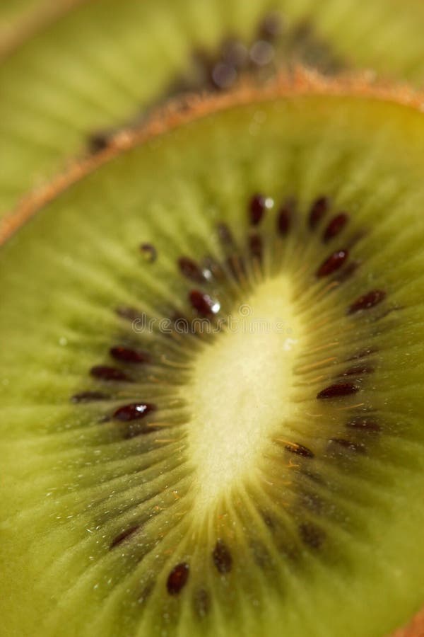 Tranches plan rapproché et détails de kiwi photographie stock Tranches plan rapproché et détails de kiwi photographie stock