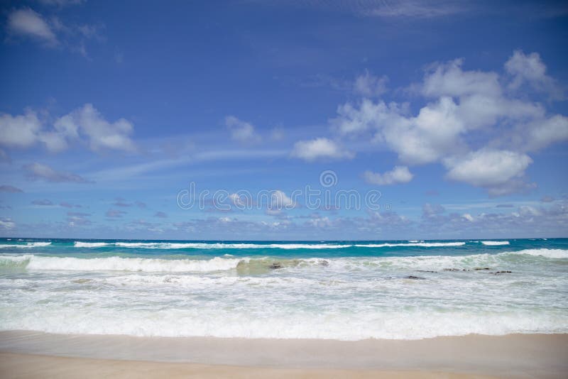 Tranquil beach scene with rolling waves at Murrel`s Beach, Portland Victoria Australia