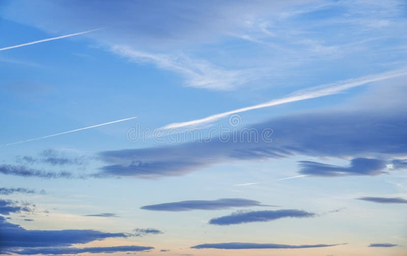 A tranquil evening sky with soft clouds stock photos