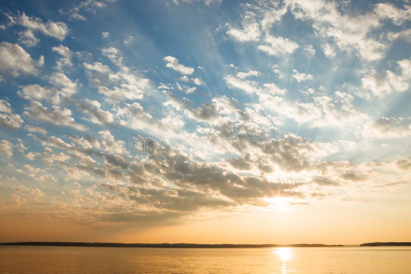 Tranquil lake scene at sunrise and clouds. Serene beach atmosphere stock images, royalty-free photos and pictures