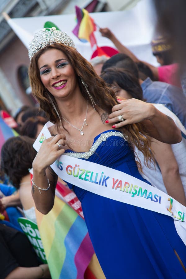 ISTANBUL, TURKEY - JUNE 22, 2014: Trans beauty in 5. Trans Pride March held in Istiklal Avenue, Istanbul. Thousands of people gathered to celebrate begining of LGBT Honor week. ISTANBUL, TURKEY - JUNE 22, 2014: Trans beauty in 5. Trans Pride March held in Istiklal Avenue, Istanbul. Thousands of people gathered to celebrate begining of LGBT Honor week.