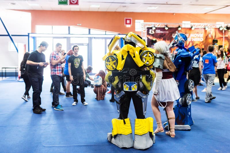 Transformers cosplayers and visitors taking pictures stock image