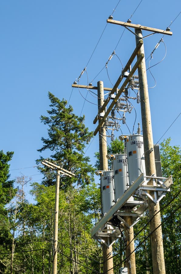 Electricity Transformers on a Pole Stock Photo Image of equipment