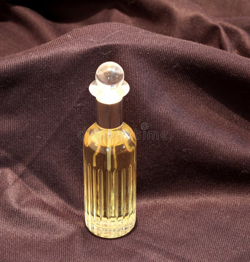 A transparent perfume bottle stock image