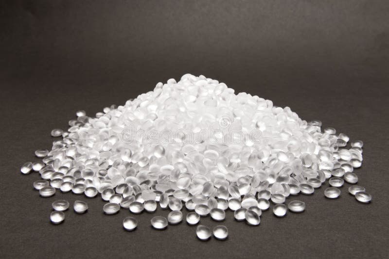 Transparent Polyethylene granules on dark .HDPE Plastic pellets. Plastic Raw material . IDPE.