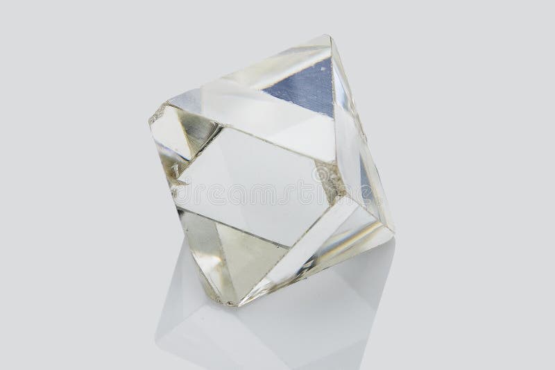 rough diamond, crystal in an allotropic form of carbon, uncut gemstone,  concept of luxury or wealth Stock Photo