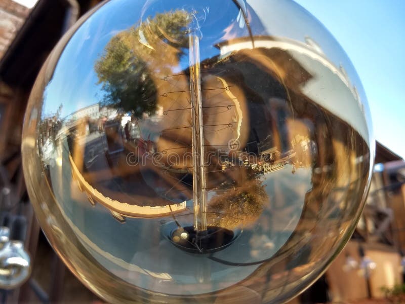 Transparent round bulb of the street lamp