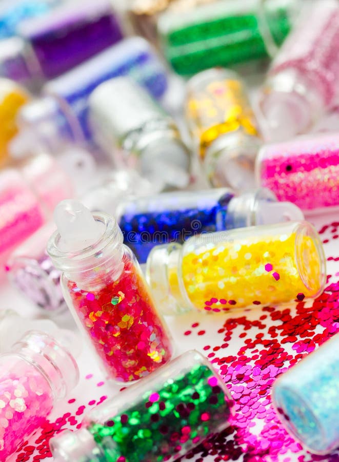 Transparent Small Bottles with Glitter Makeup and Nail Art Stock Image