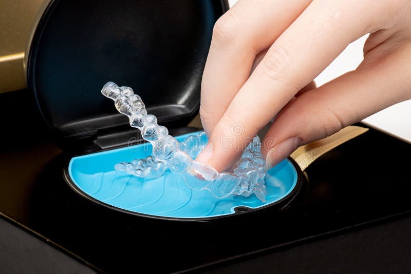 Transparent Teeth Aligners in a Box. Invisible Braces. Clear Teeth