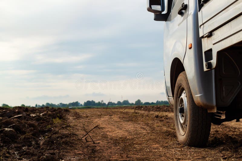 Mini truck car wheel on dirt road