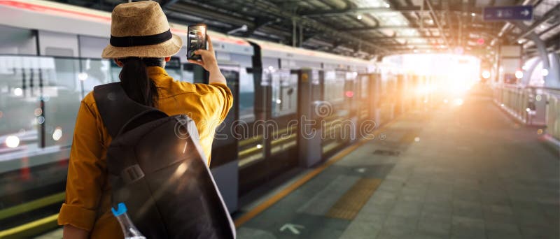 Transportation And Travel Traveler Women Are Take Photo Electric Train In Station While Waiting 