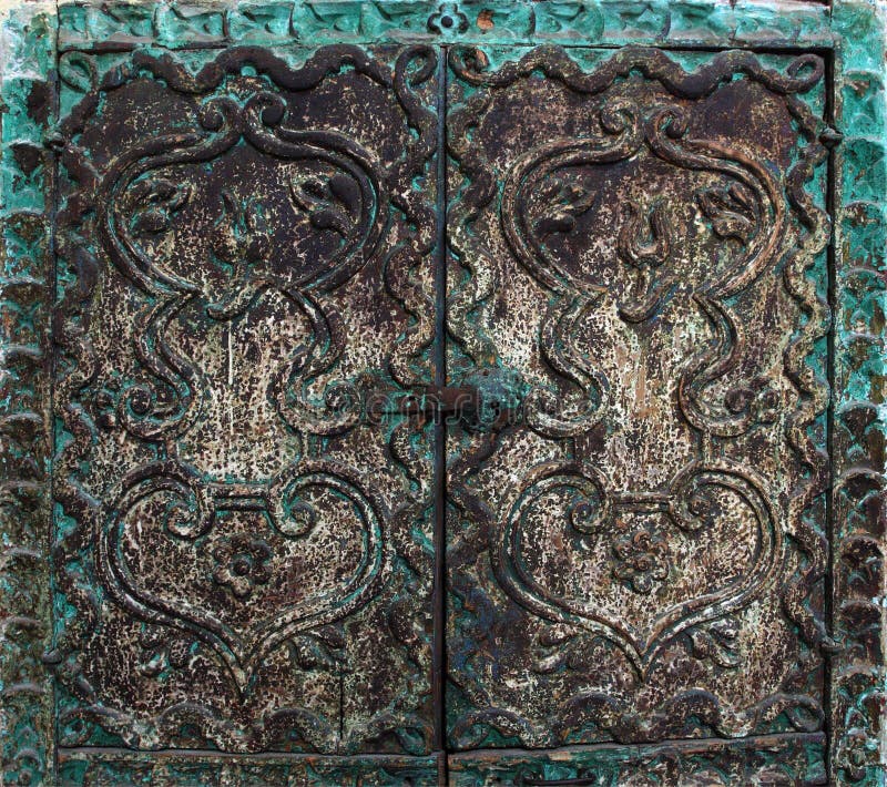 Fine detail of green ancient door. Fine detail of green ancient door