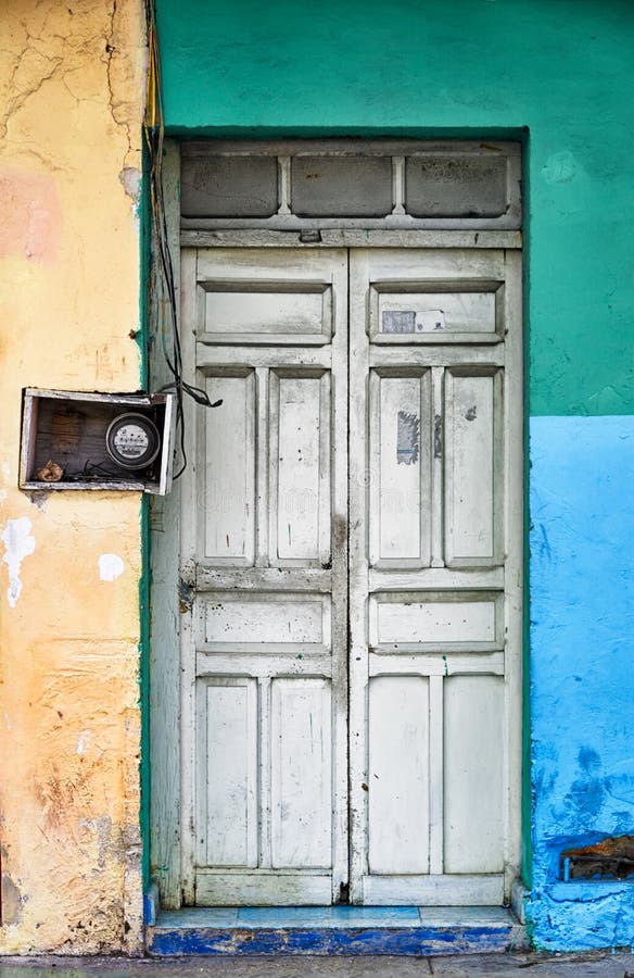 Door fronting a dilapidated building in Mexico. Door fronting a dilapidated building in Mexico