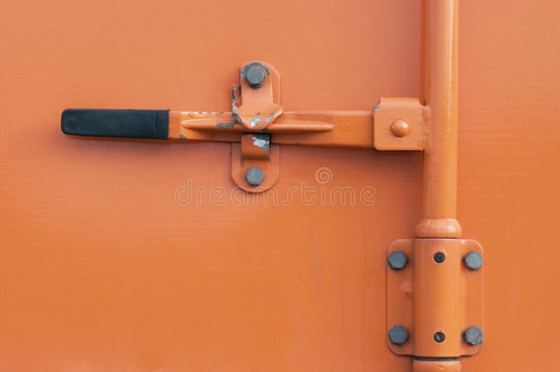 Orange color locked container door. Orange color locked container door.