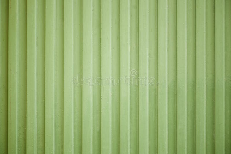 Detail of a green metal gate, ideal for funds. Detail of a green metal gate, ideal for funds