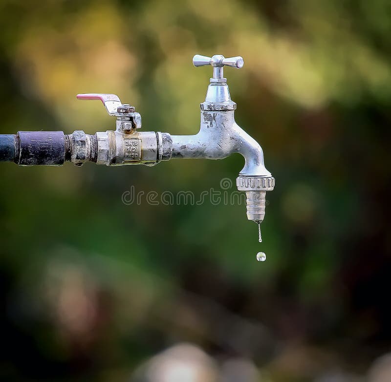 Water tap driping. Taken in countryside. Water tap driping. Taken in countryside