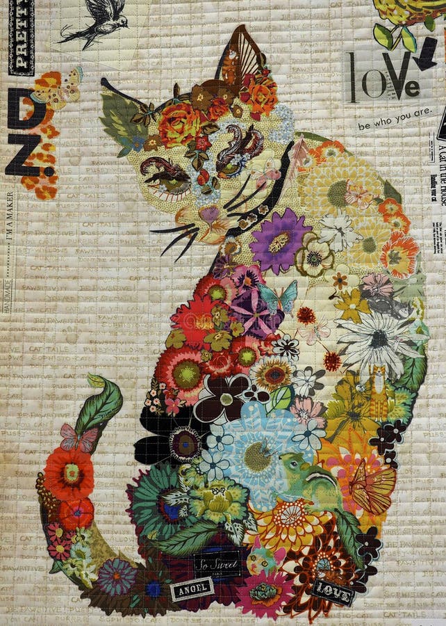 Contemporary quilt with a multicoloured floral cat   at the Festival of Edmonton Quilts June 1, 2019. Contemporary quilt with a multicoloured floral cat   at the Festival of Edmonton Quilts June 1, 2019