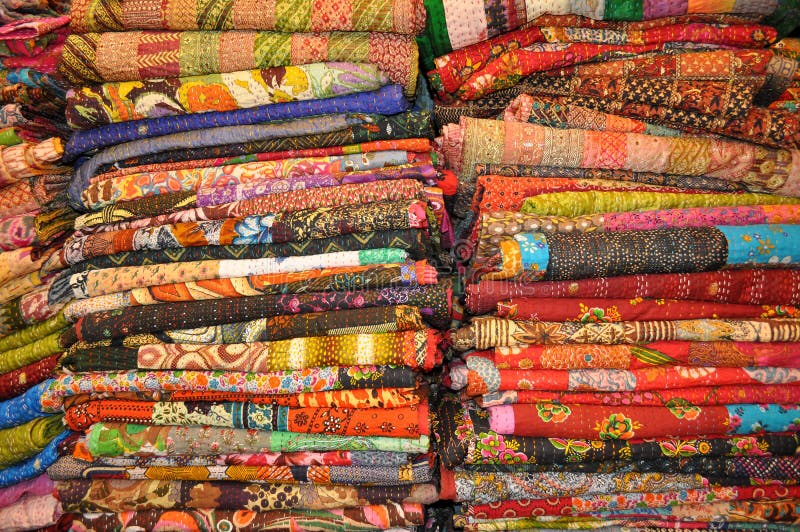 Stack of colorful Jaipur (India) quilts. Stack of colorful Jaipur (India) quilts