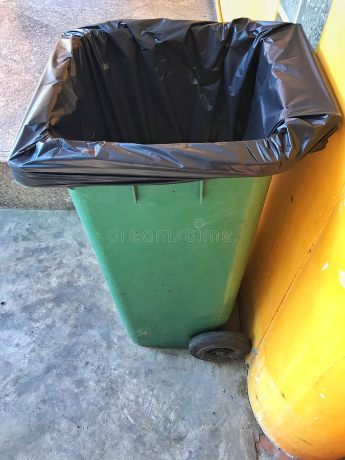 Trash bin with garbage bag stock photo. Image of waste 166728452
