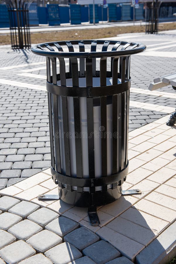 The trash bin is an ornament of city landscapes. Urn is a decoration of the city. a beautiful urn is an indicator of the city`s beauty.nmetal and stone as one royalty free stock photo The trash bin is an ornament of city landscapes. Urn is a decoration of the city. a beautiful urn is an indicator of the city`s beauty.nmetal and stone as one royalty free stock photo