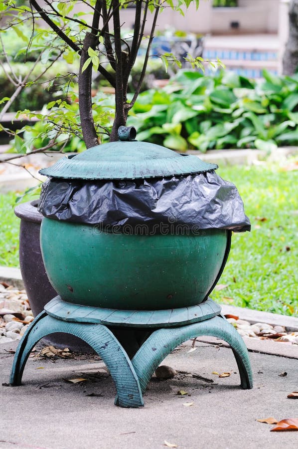 Trashcan. stock image. Image of green, sphere, tire, trashcan 27408997