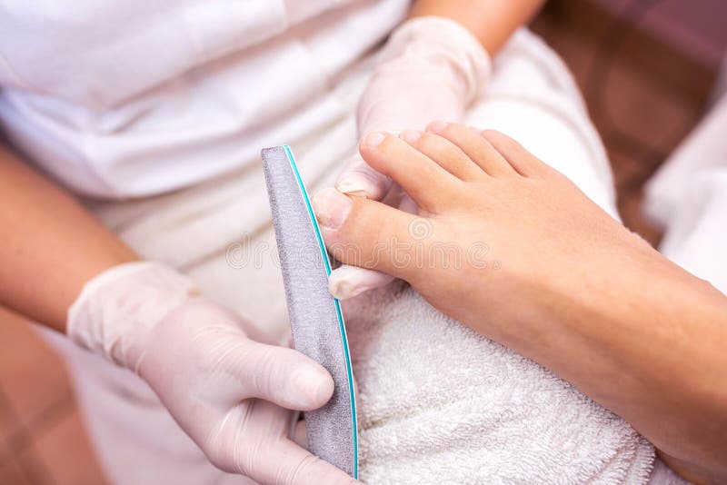 Tratamiento de uñas, concepto de pedicura, uñas limpias fotografía de archivo