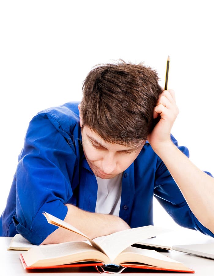 Trauriger Schüler mit Büchern stockfotografie