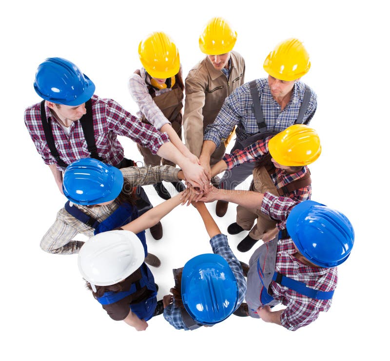 Travailleur De La Construction Empilant Des Mains Image stock Image