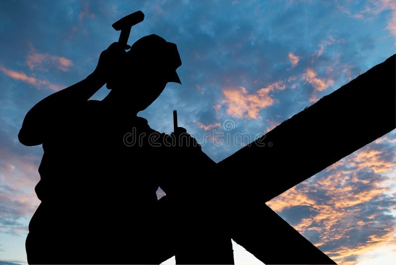 Worker silhouette with hammer at roofing works over scenic dawn or sunset. Worker silhouette with hammer at roofing works over scenic dawn or sunset