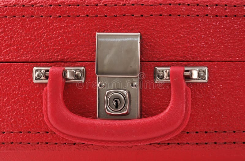 Lock on a red vintage suitcase. Lock on a red vintage suitcase