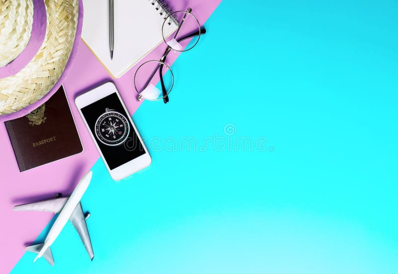 Travel accessories and gadgets top view flatlay on blue pink. Travel accessories objects and gadgets top view flatlay on blue pink royalty free stock image Travel accessories and gadgets top view flatlay on blue pink. Travel accessories objects and gadgets top view flatlay on blue pink royalty free stock image
