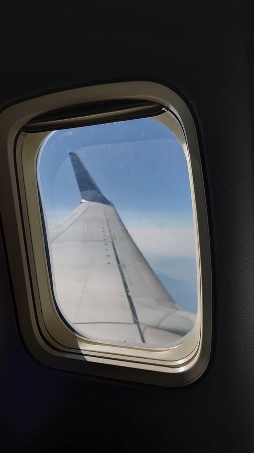 Travel by Airplane Window Seat View Stock Image - Image of reflection ...