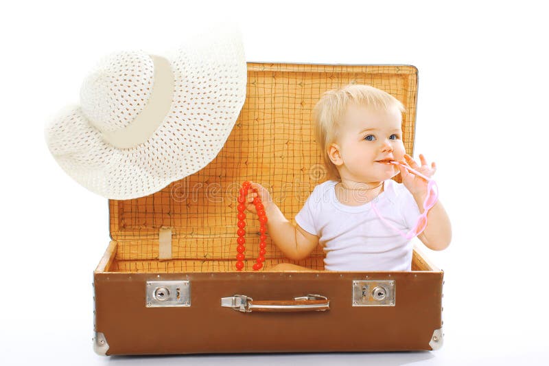 Travel, children, vacation - concept. Cute funny baby playing